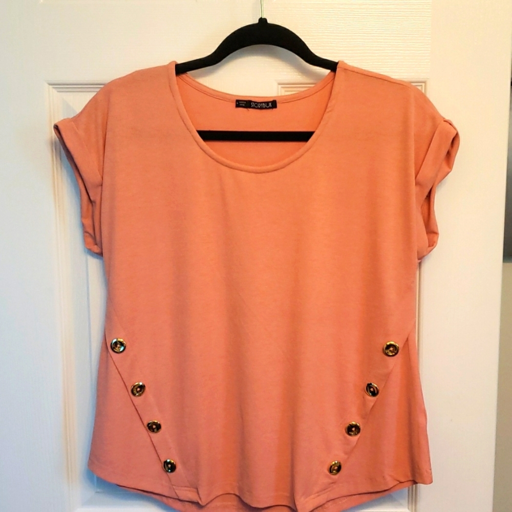 Like new, Size Medium, light salmon in color